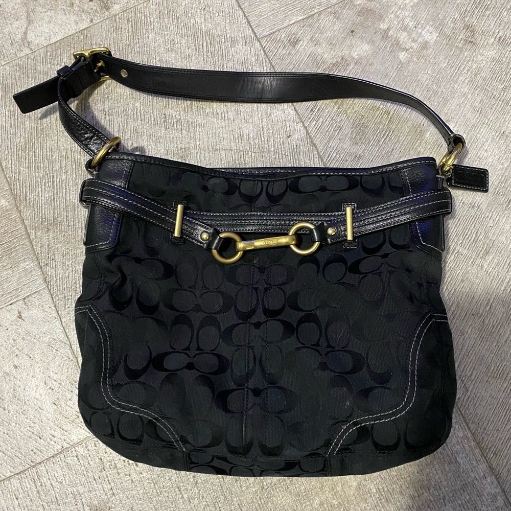 This is a black authentic coach handbag